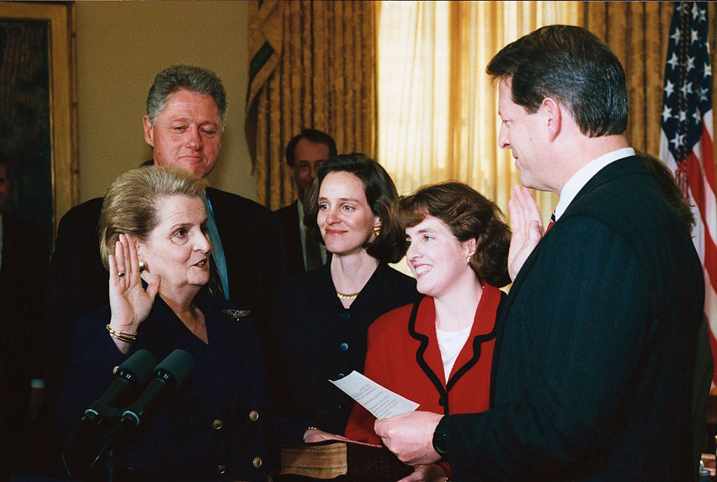 Madeline Albright being sworn in as Secretary of State by Vice President Al Gore in 1997. She was the first woman to hold the "top diplomat" position in the country's history